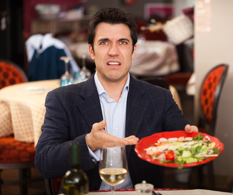 This man does not like salad (image via Shutterstock)